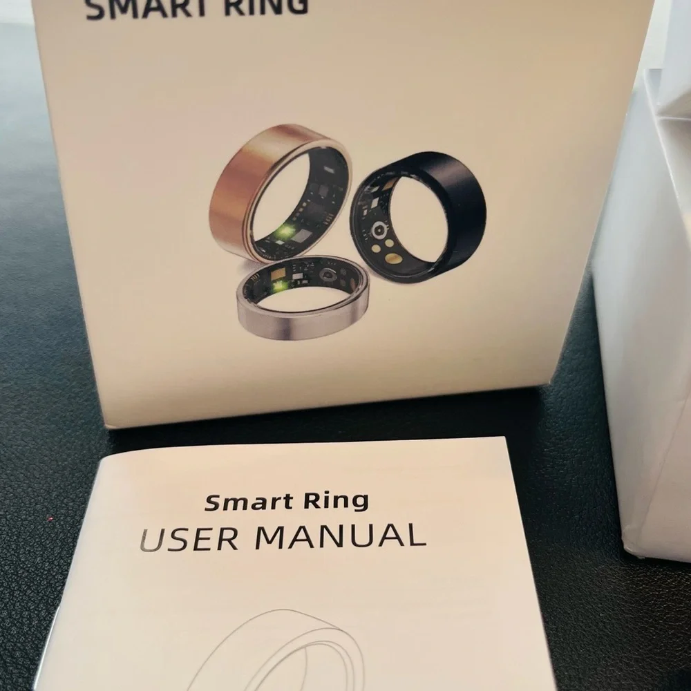 Black Smart Ring - size 8. Comes With Instructions and Charging Cord.
